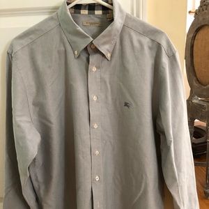 Classic Burberry print on collar and cuff.